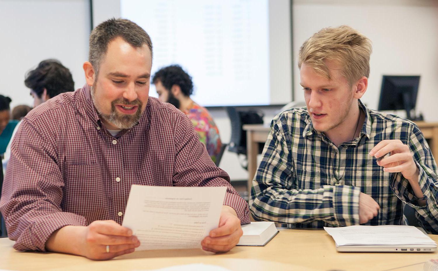 Leland Saunders teaching a philosophy student