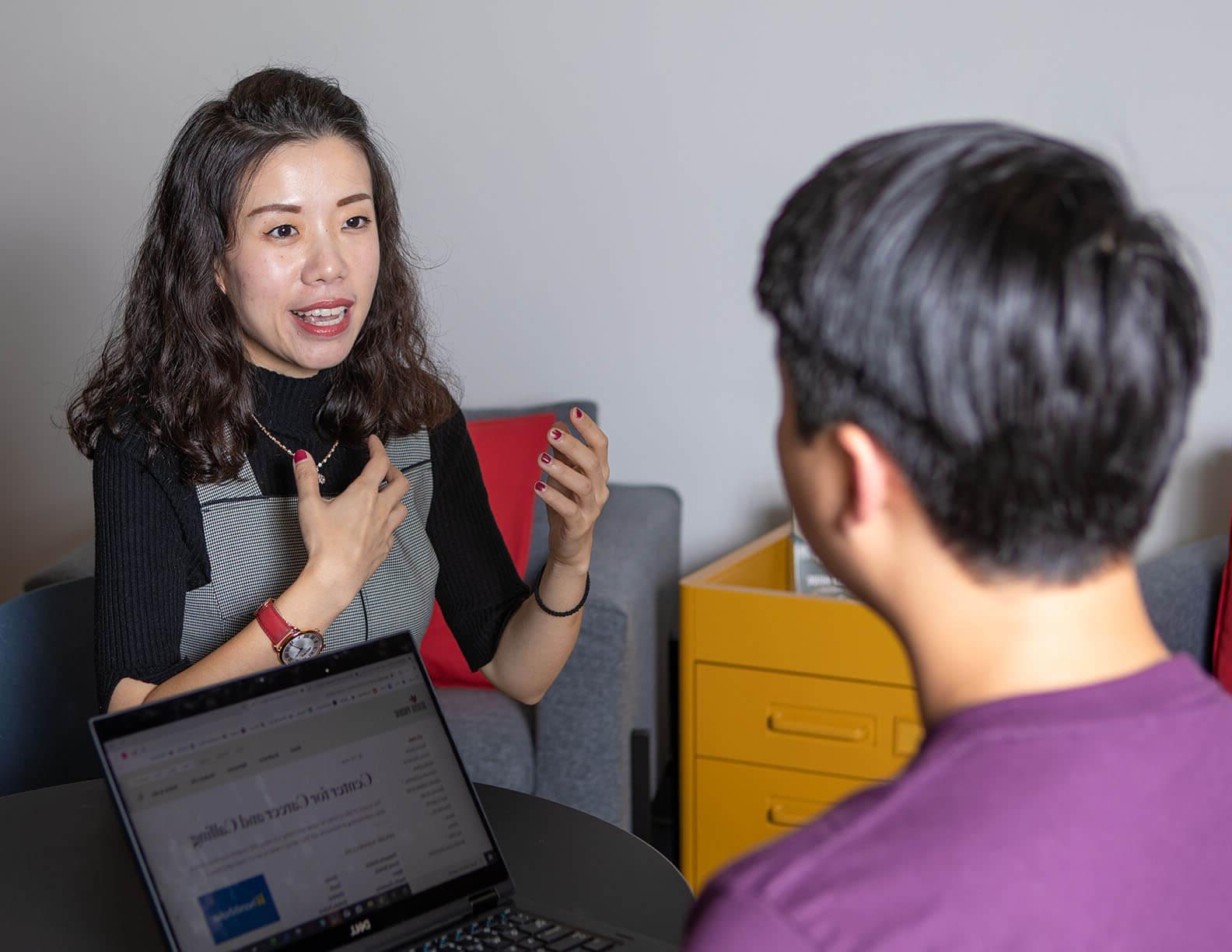 An SPU student meets with a career counselor | Photo by Lynn Anselmi